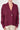 Front view of Dolci Shiraz Cashmere Cardigan — Italian-made deep Shiraz cable-knit cashmere with ribbed detailing and button closure.